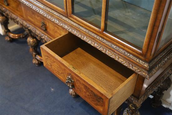 A 1930s Queen Anne revival walnut display cabinet, W.4ft 10in. D.1ft 4in. H.4ft 10.5in.